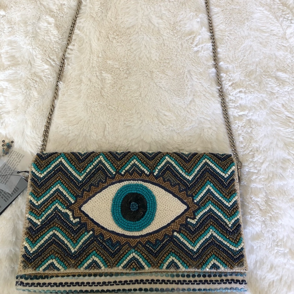 America and Beyond Grecian nights evil eye clutch